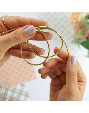 Gold elastic cord