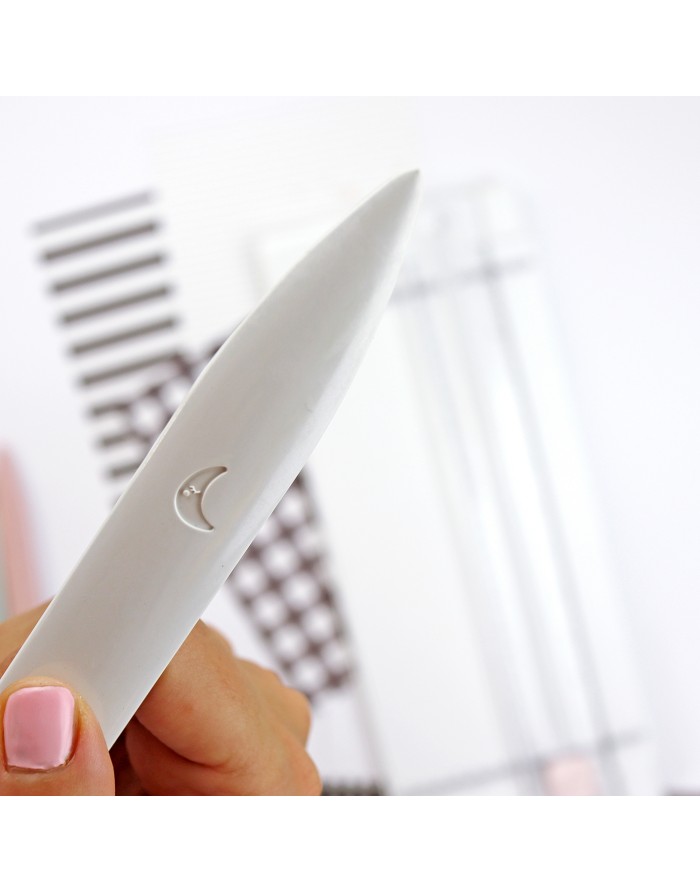 White bone folder White bone folder